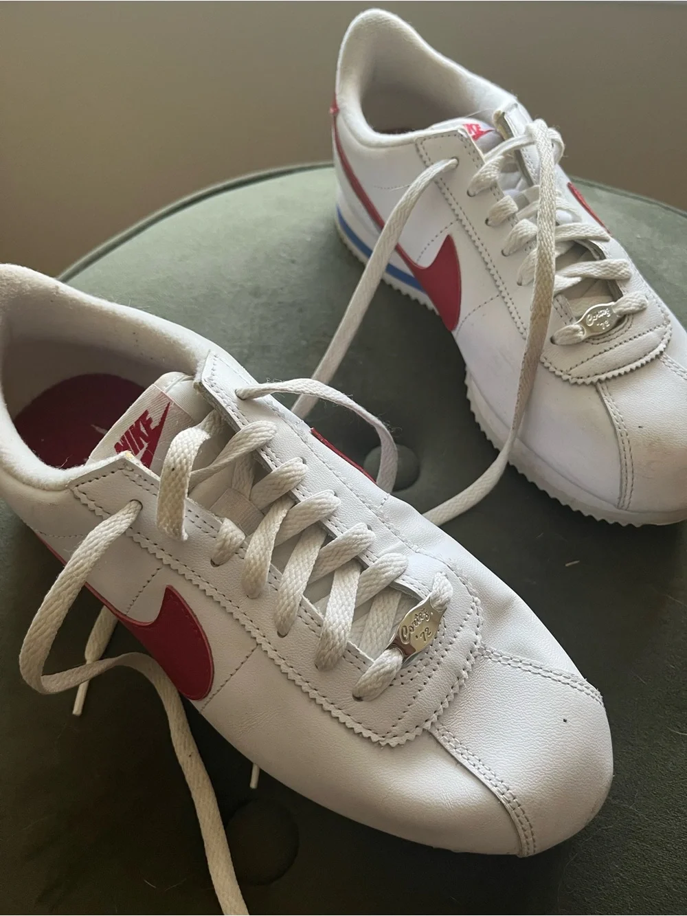 Nike Women's 8.5 White Leather Sneakers with Red Swoosh